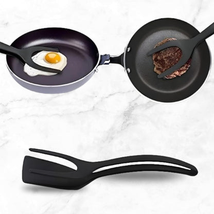 Dishwasher-safe NestBlend egg flipper drying on kitchen rack


